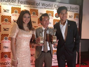 "Best lead actress in a foreign language film" winner Kimberly Anne Cordero, film director Carlo Jay Ortega Cuevas, and "Best lead actor in a foreign language film" nominee John Stevenson Tabangay pose with the trophies won by INCinema's "Walang Take Two" at the Berlin International Filmmakers' Festival held on Saturday, October 29.  The INC-produced film bagged the "Jury Award" and the "Best Lead Actress in a foreign language film" during the awards night on Saturday in Berlin, Germany.  (Eagle News Service)